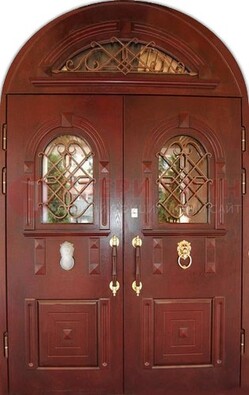Стальная арочная дверь со стеклом и ковкой ДА-30 в дом из кирпича в Сертолово