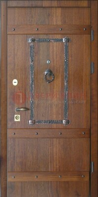 Темная стальная дверь с массивом дуба с ковкой ДМД-37 в Сертолово