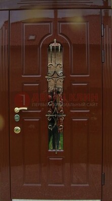 Красивая металлическая дверь со стеклом и ковкой ДСК-33 в Сертолово